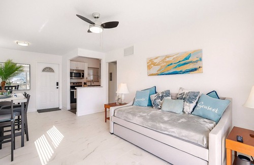 Capri Isle Condo | Treasure Island Waterfront Oasis Minutes to Beach Dock Sunsets at John’s Pass