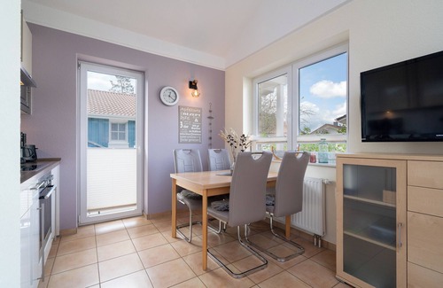 Pelzerhaken House | Vacation home close to the beach for 4 people and dog with sauna, fireplace and fenced garden.