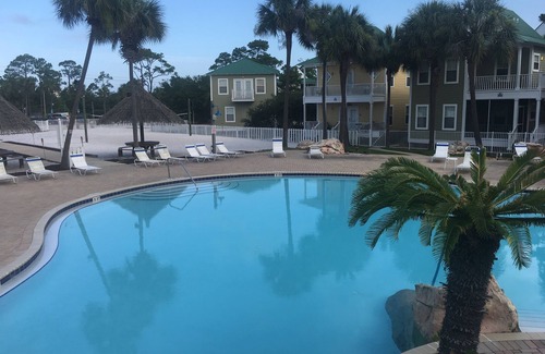 Ono Island Condo | Vacation Paradise at Purple Parrot Resort Relax at the Tiki Bar New on