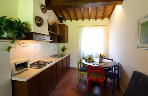 Castelfranco Piandisco Villa | Villa converted from old outbuildings with private swimming pool. Small restaurant on site run by th