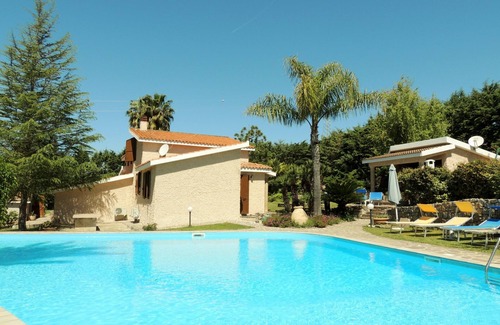 Alghero Villa | Villa Donzell, 14m private pool and Jacuzzi, Large Garden, Kids Play Area
