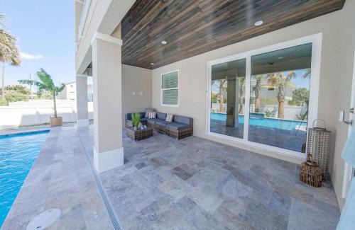 Marineland Acres House | Villa Nautilus New Lux 3 Story Pool Hot Tub Home with Elevator- Steps away from the beach