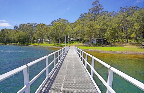 Murrays Beach House | Wallarah Forest Stay - heated swim spa and resort style grounds