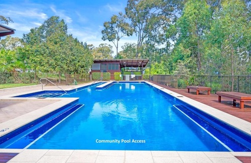 Murrays Beach House | Wallarah Forest Stay - heated swim spa and resort style grounds