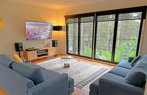 Murrays Beach House | Wallarah Forest Stay - heated swim spa and resort style grounds