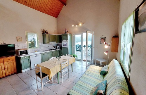Saint-Ellier-du-Maine Cottage | Waterfront Fishing Cottage with Terrace and Scenic Views