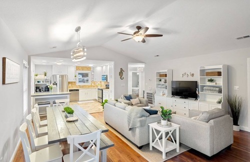 Colington Harbour House | Waterfront! Game Room, Hot Tub, Theater Room, Fire Pit, Kayaks, SUPs,YMCA,DogsOK