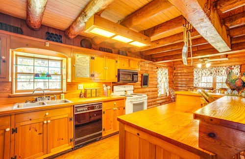 West Livingston Cabin | Waterfront Livingston Log Cabin w/Private Dock!