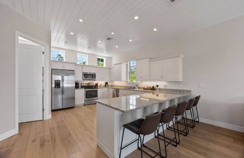 South Island House | Waterfront Luxury | Walk to Beach | Heated Pool