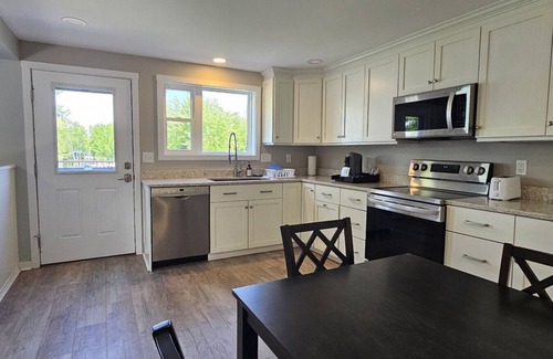 Greenville Junction Hotel | Waterfront Motel - Mountain View- ATV Access