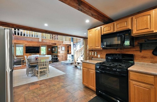 Iron River Cabin | Whispering Waters Lodge with Waterfall, Pond and Trails on Property in Delta, WI