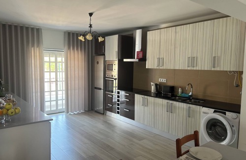 Fatima House | White Guest Fátima