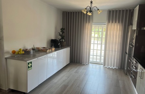 Fatima House | White Guest Fátima