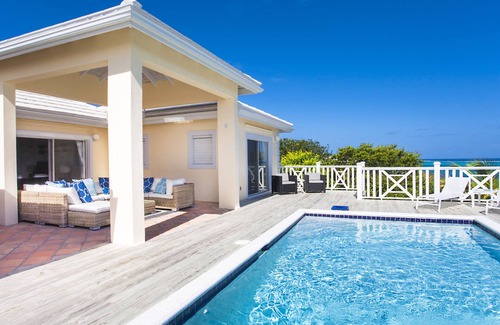 Providenciales Villa | White Osprey: Spectacular views from every room and pool overlooking the ocean