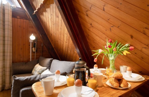 Carrbridge Cabin | Wolf Lodge - a lodge that sleeps 4 guests in 2 bedrooms