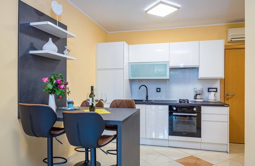 Fazana Apartment | Wonderful apartment for 4 people with pool and garden