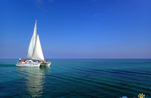 San Pedro Boat Rental | Xsite Belize Sailing Catamaran in Belize