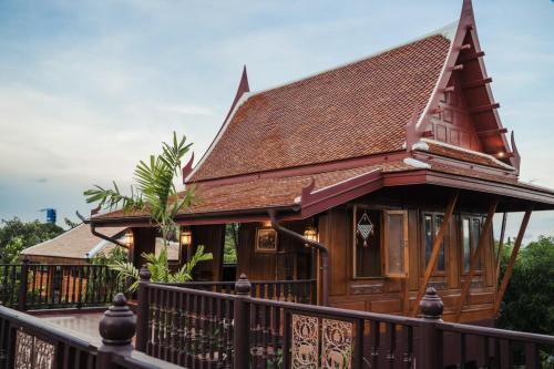 เรือนไทยพราวพิมาน Proudpiman Thai House
