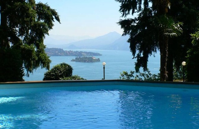 1-bedroom apartment in an Art Nouveau villa with communal pool