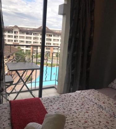 1 Bedroom unit with balcony and facing amenities and just beside SM Ecoland