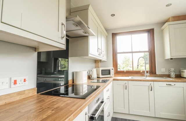 1 LEESRIGG COTTAGES, pet friendly, with open fire in Aspatria