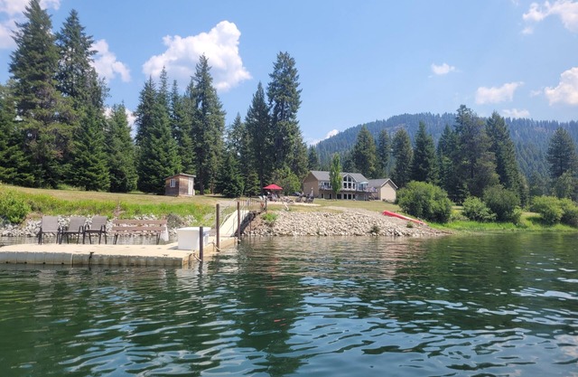 10 Acre Private riverfront retreat w/dock and 1,000 ft waterfront