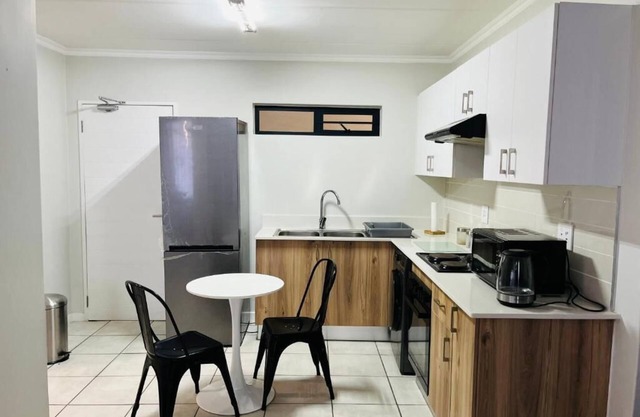 10 minutes drive from OR Tambo International Airport, situated at Greenpark!