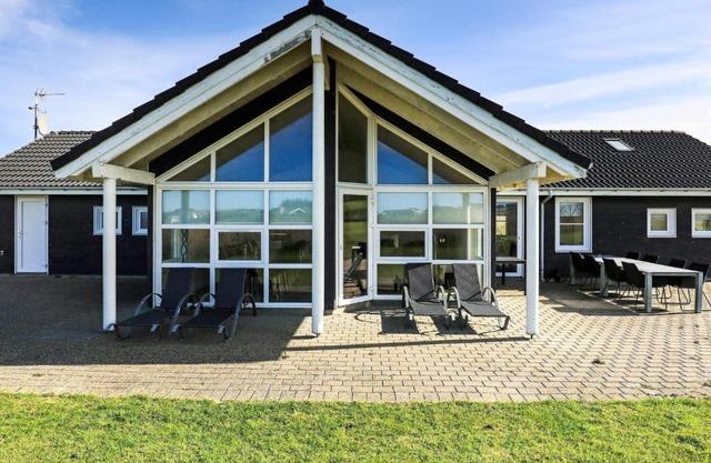 10 person holiday home in L kken