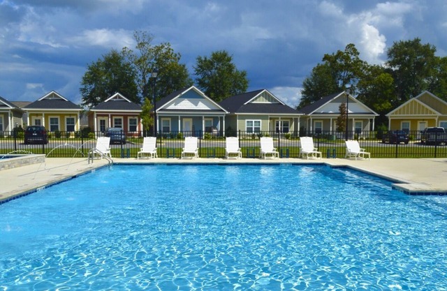 100 Riverstone Way . with Amazing Amenities!