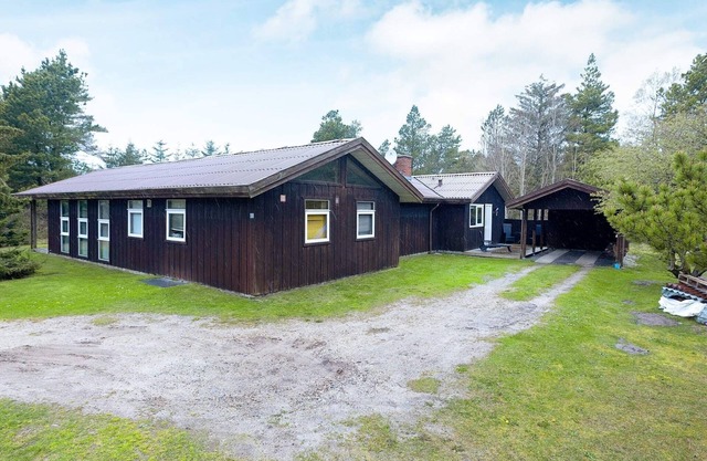 12 person holiday home in Pandrup-By Traum