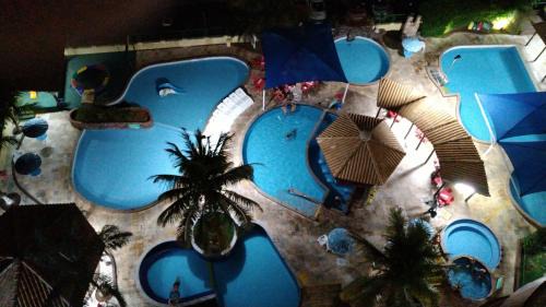 1406 AP 2 Quartos, Banheira de Hidro privativa , bebidas liberadas nas piscinas e internet no ap, proximo ao shopping singapura