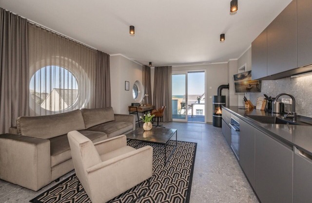 150m to the beach! Modern 60m² sea view apartment: balcony & fireplace, for 4 pers.