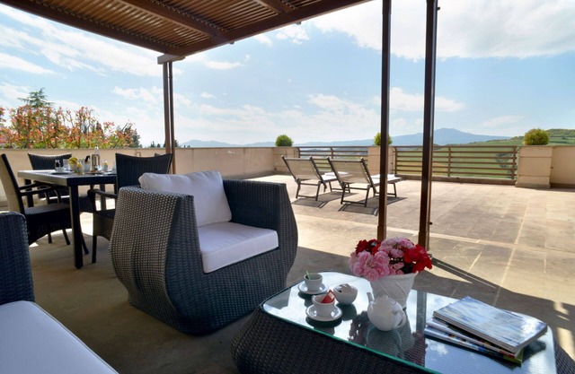 1700 square feet, 2 bedrooms, 2 bathrooms, kitchen, living & panoramic terrace