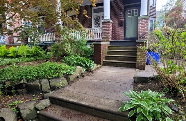 1900 house on tree-lined Street in Germantown