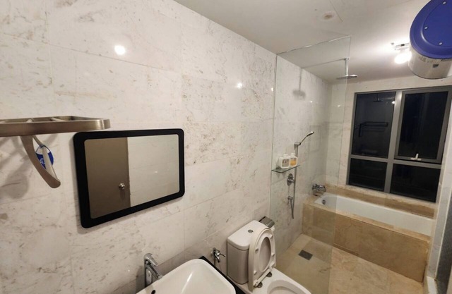 2-bedroom condo with AC, fitness room in enchanting Taman Melaka Raya