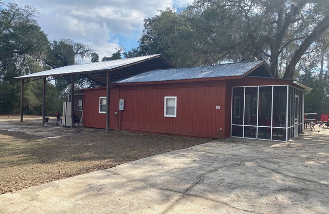 2 BR 2 Bath Cabin on private 1.5 acres.Huge cement pad for parking. No clay road