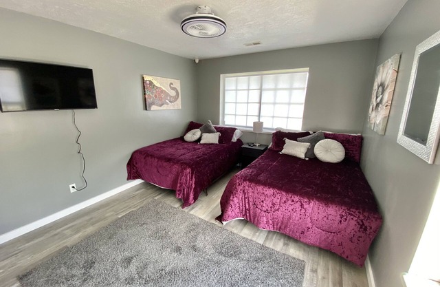 2 Double Beds Rm #4 with view of the San Rafael Swell and smart TV. India room.