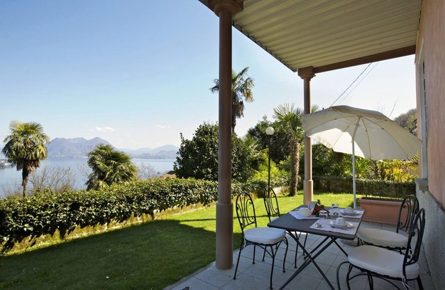 2-room corner apartment with terrace and garden in an Art Nouveau villa with communal pool