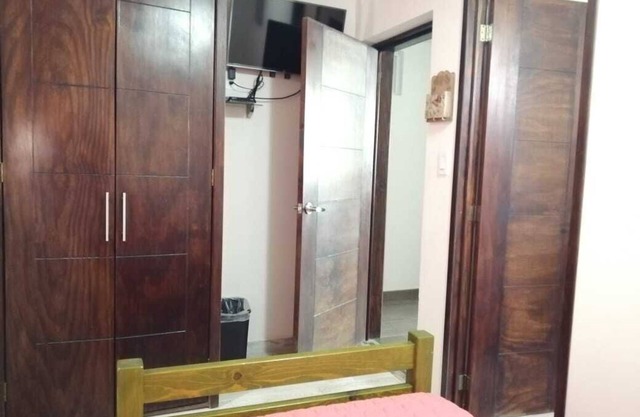 2 single rooms, and 1 double room with their private bathroom, kitchen.microwave