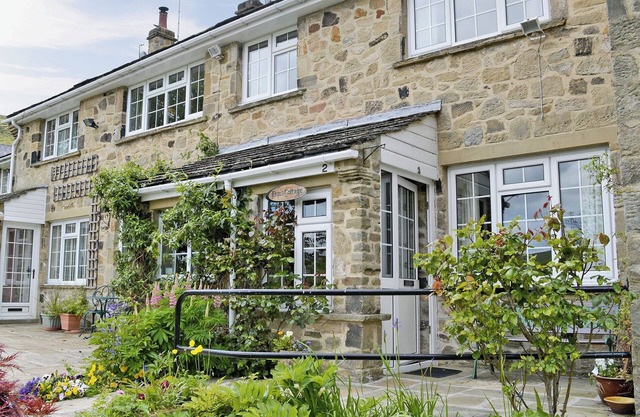 20 steps to entrance with handrail.