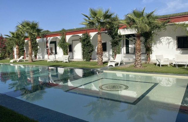 23 suites private villa with a huge pool and a party space