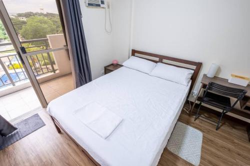 2BR Fully Air-Conditioned Staycation PLUS Free Parking