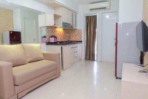 2BR with Cozy Style at Bassura City Apartment By Travelio