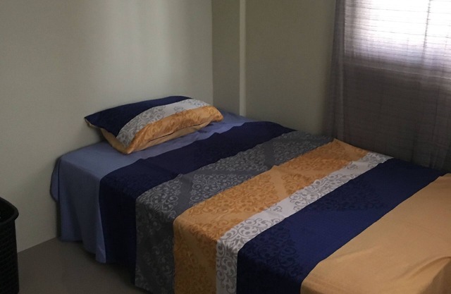 2storey building Condotel with 2 bedrooms, Kitchenette,terrace and parking space