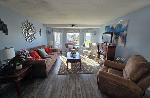 3 bed with fenced yard, fire pit, swings, 30 min from Clarenville