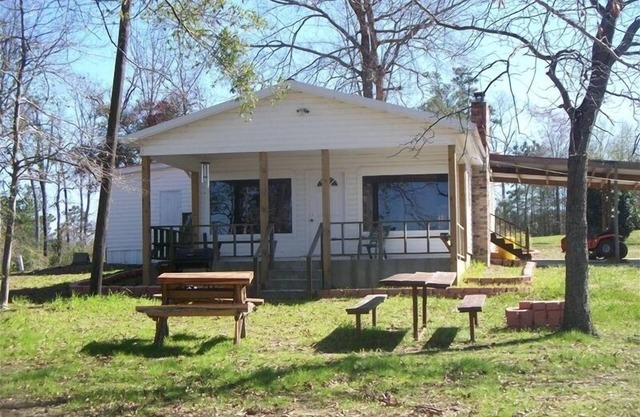 3 bedroom, 2 bath home with Awesome Lake Views and Your Very Own Private Pier.