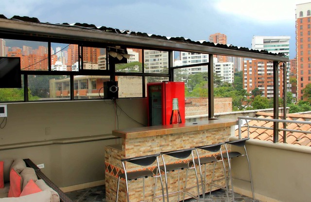 3 Bedroom duplex Penthouse Private roof 2 blocks from Lleras AC Hot tub Security