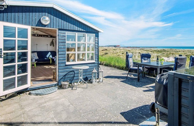 4 person holiday home in Grenaa