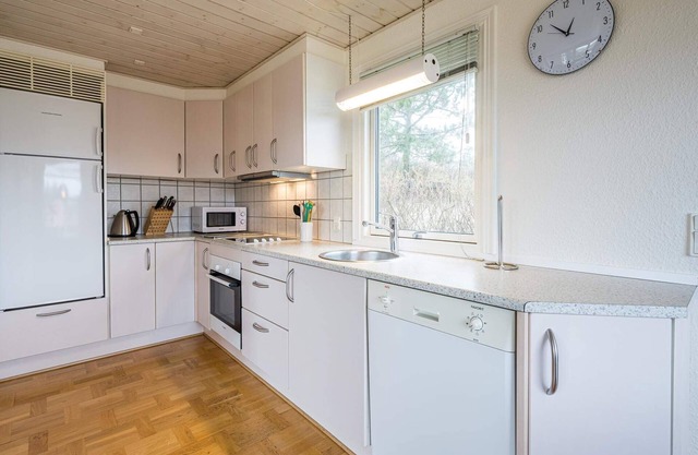 4 person holiday home in Henne