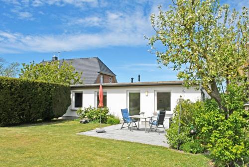 4 - Sterne Ferienhaus Am Brink mit Gartenter und Meerblick